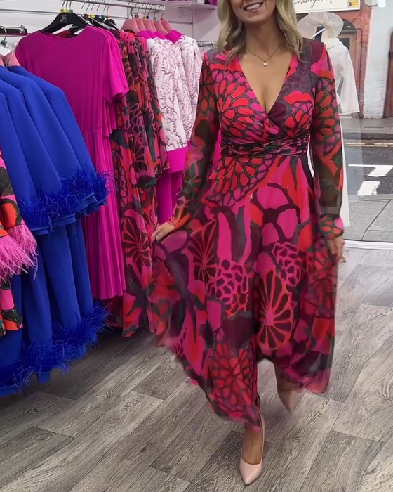 Wijde swingjurk met diepe V-taille