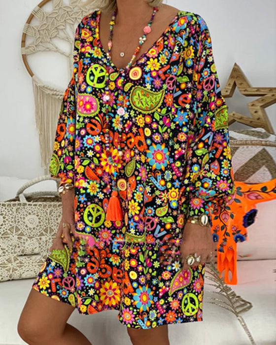 Losse jurk met bloemen- en paisleyprint