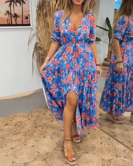 Jurk met rozenprint en splitten