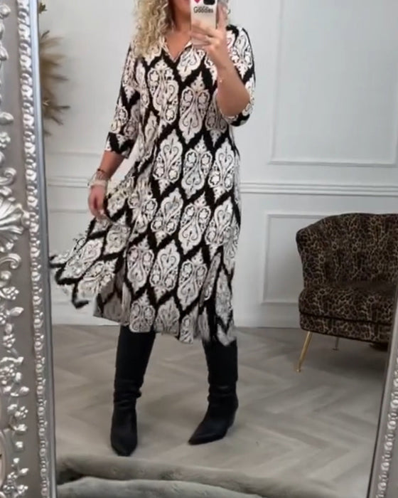 Zijsplit jurk met bedrukte revers