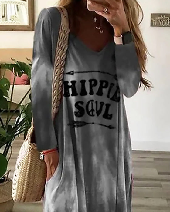 Jurk met V-hals en steekzakken