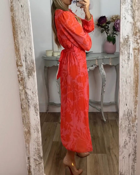 Jurk met V-hals en geknipte taille