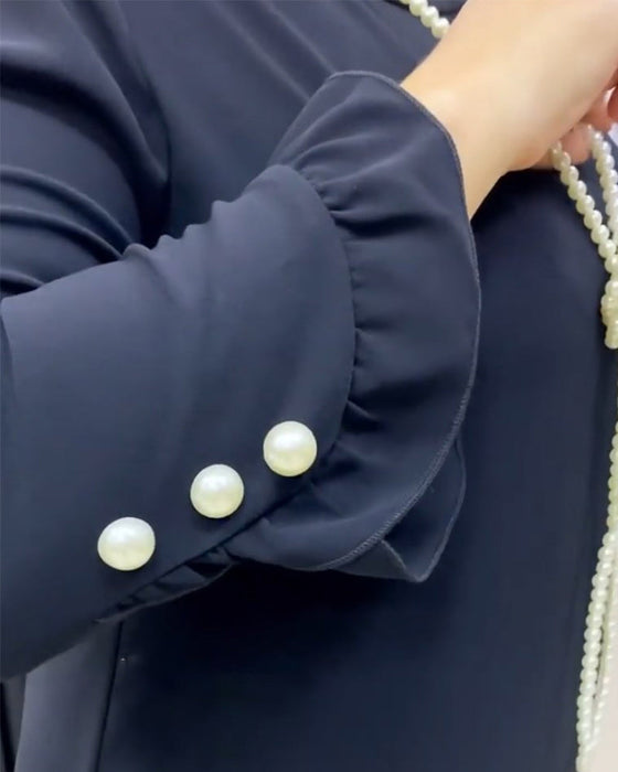 Lapwerk jurk met ruches in effen kleur