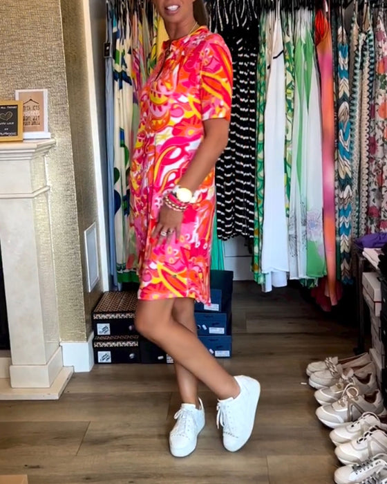 Jurk met zakken en prints en korte mouwen