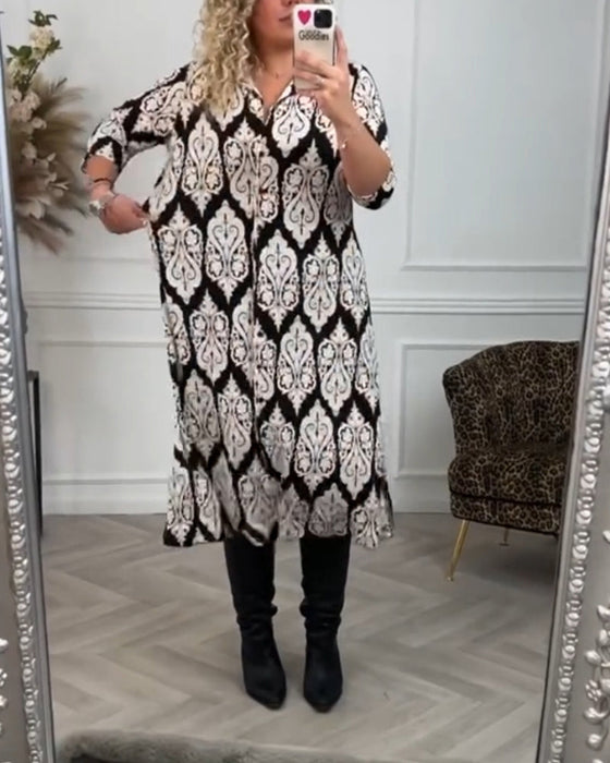 Zijsplit jurk met bedrukte revers