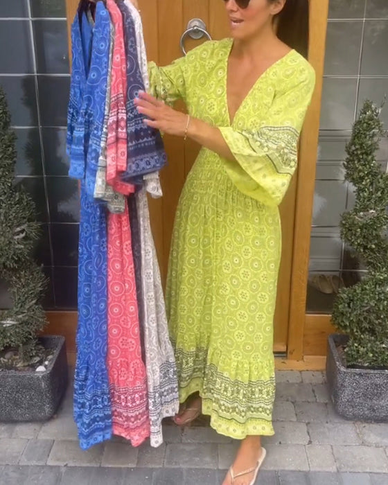 Lange jurk met een diepe V-hals en lange mouwen