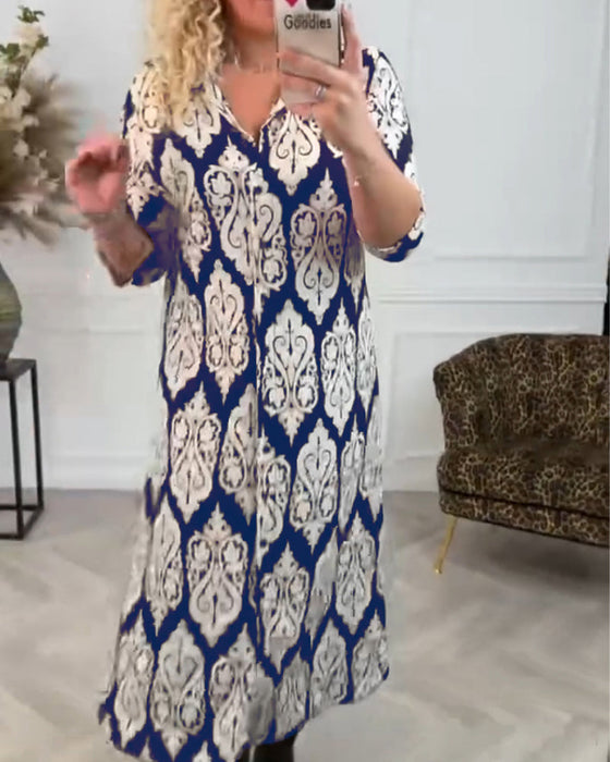 Zijsplit jurk met bedrukte revers