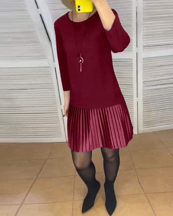 Jurk met geplooide panelen en effen kleuren