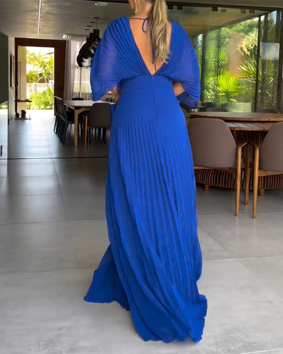 Jurk met plooien en ingesnoerde taille