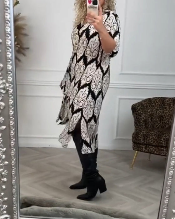 Zijsplit jurk met bedrukte revers