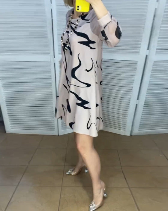 Eenvoudig bedrukte jurk met ronde hals