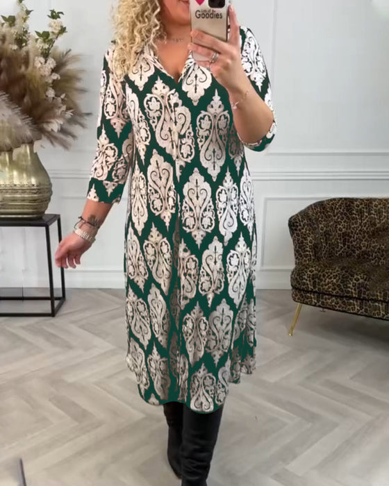 Zijsplit jurk met bedrukte revers