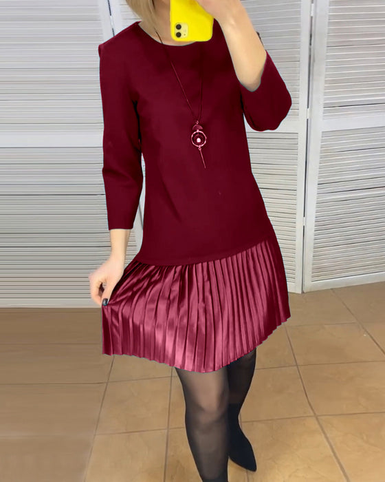 Jurk met geplooide panelen en effen kleuren