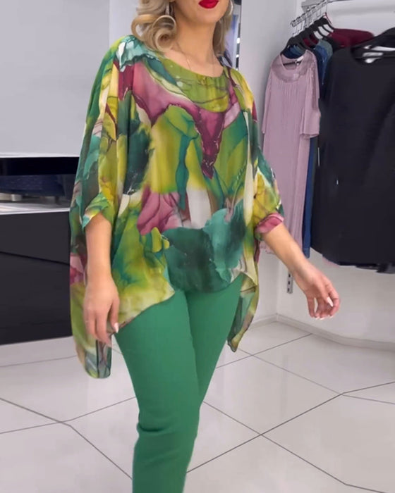 Blouse met ronde hals en vleermuismouwen met print