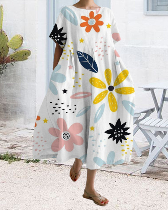 Wijde jurk met korte mouwen en print