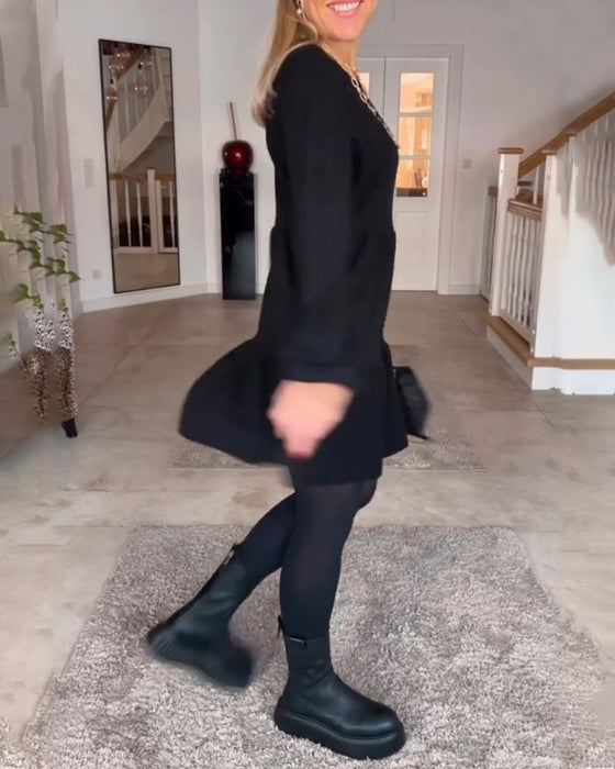 Eenvoudige effen jurk met lange mouwen