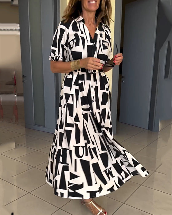 Jurk met geometrische print en losse pasvorm