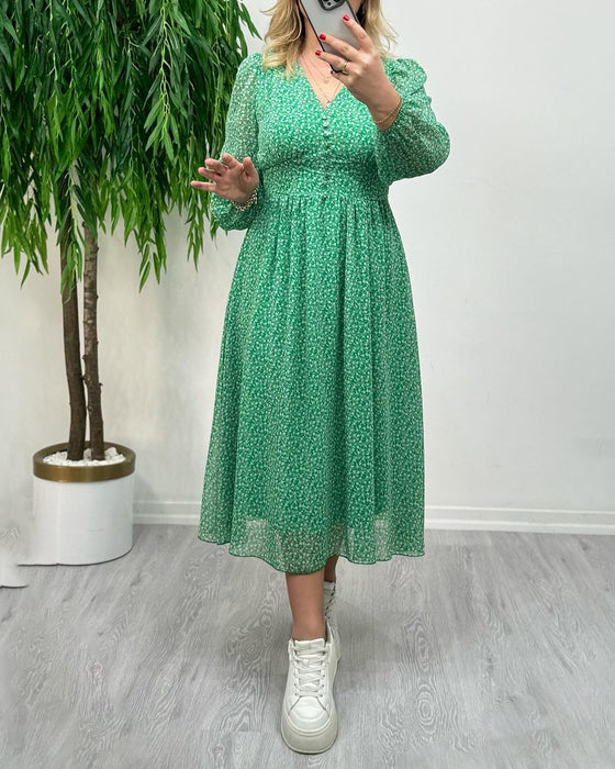 Elegante jurk met knopen en print