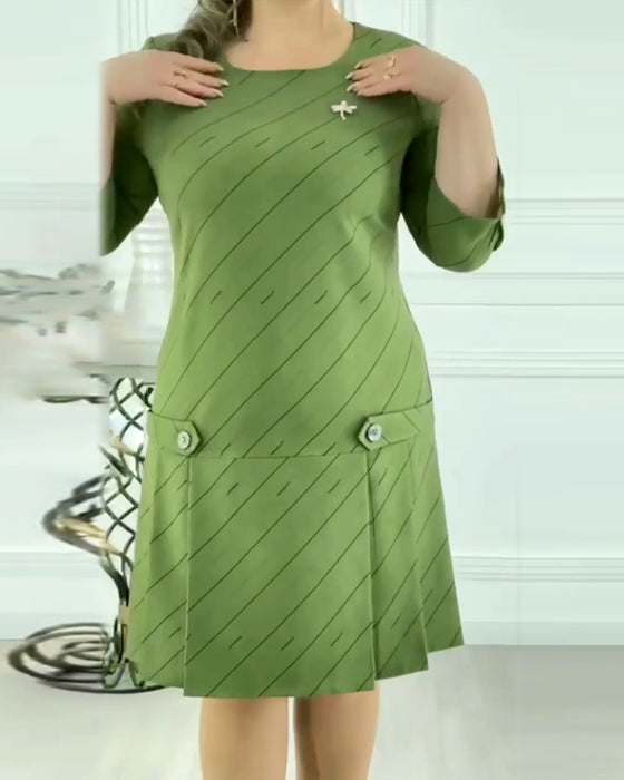 Elegante jurk met ronde hals en lijnprint