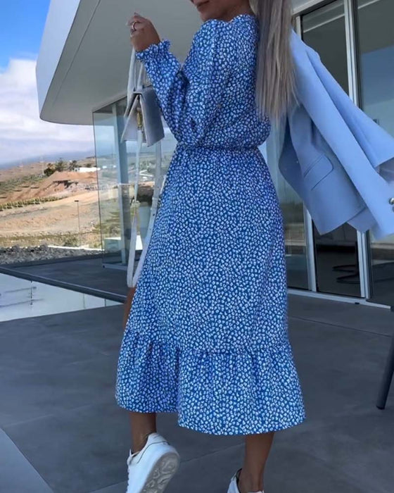 Jurk met bloemenpatchwork en V-hals