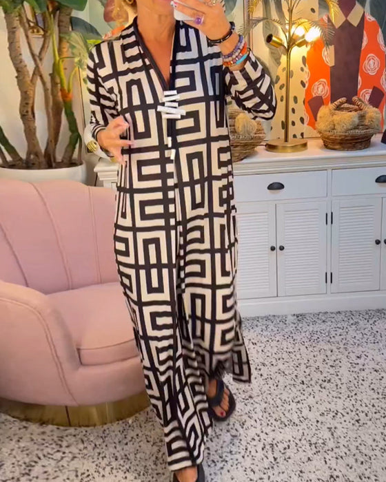 Jurk met geometrische print en V-hals