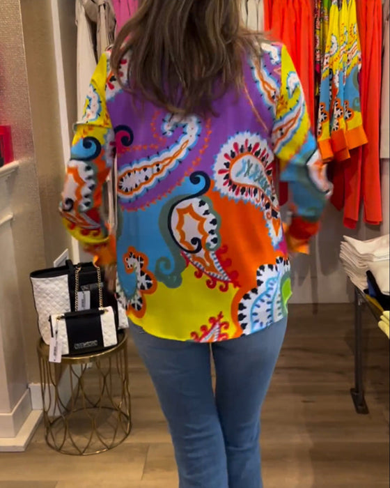 Blouse met lange mouwen en kleurrijke V-hals met print