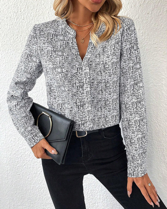 Elegante blouse met lange mouwen en V-hals
