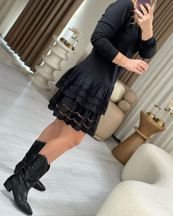 Elegante kanten jurk met lange mouwen