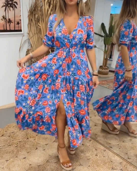 Jurk met rozenprint en splitten