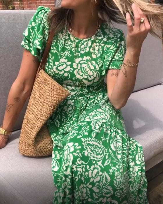 Lange jurk met bloemenprint en korte mouwen