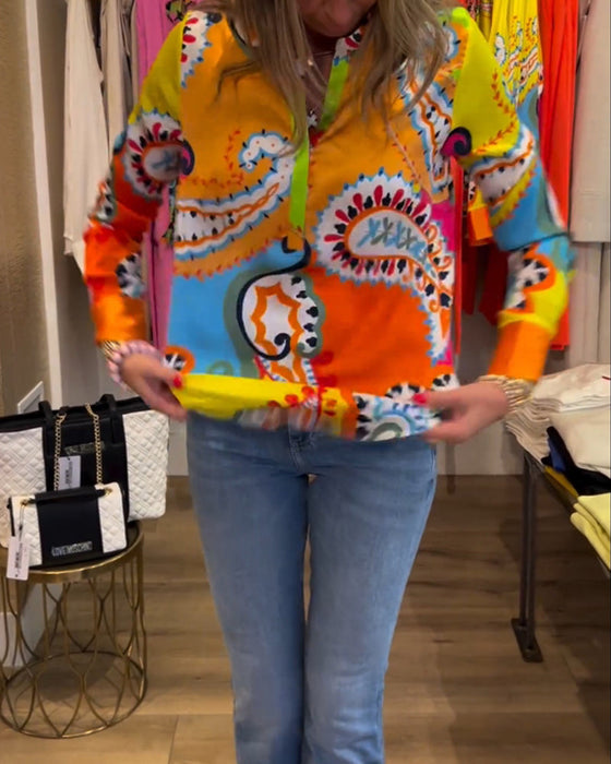 Blouse met lange mouwen en kleurrijke V-hals met print