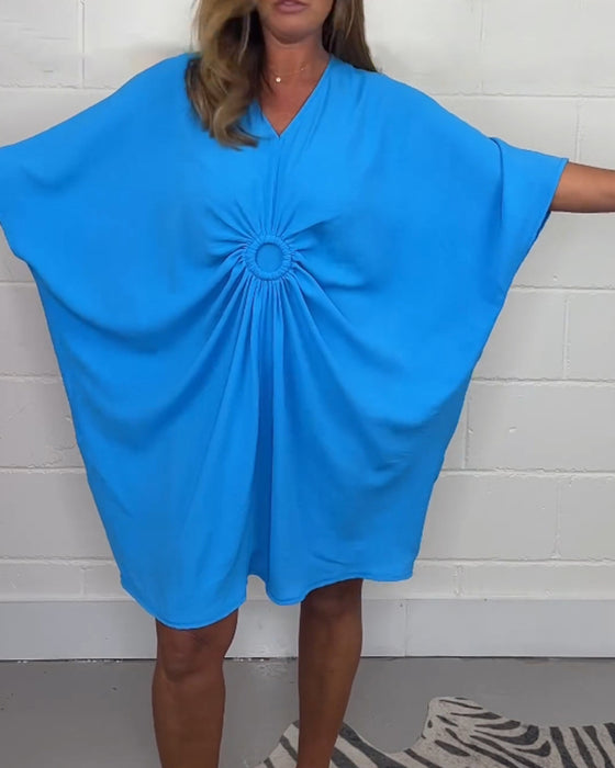 Effen jurk met v-hals en vleermuismouwen