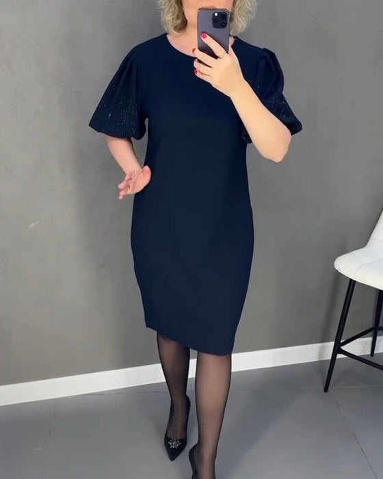 Elegante jurk met korte mouwen en pofmouwen