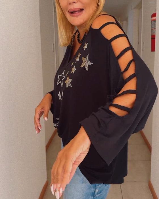 Off-shoulder top met sterrenprint en uitsnijding