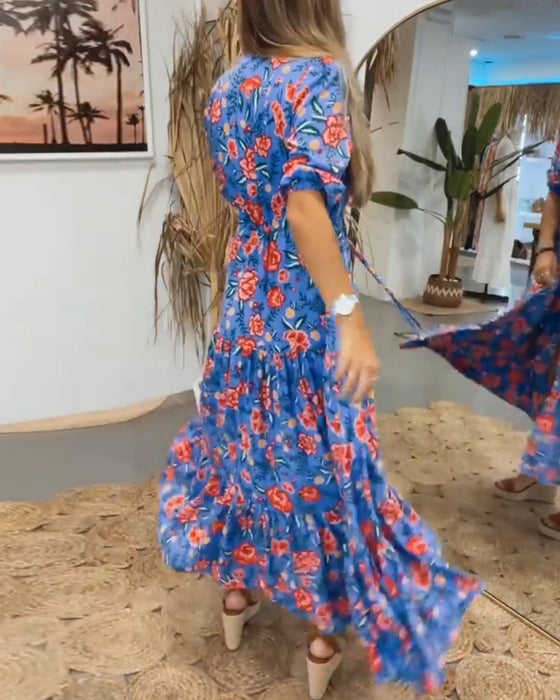 Jurk met rozenprint en splitten