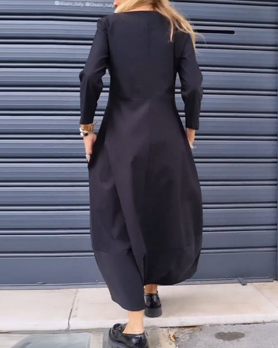 Effenkleurige jurk met ritssluiting aan de zoom