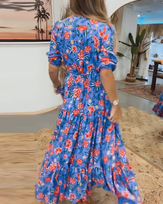 Jurk met rozenprint en splitten