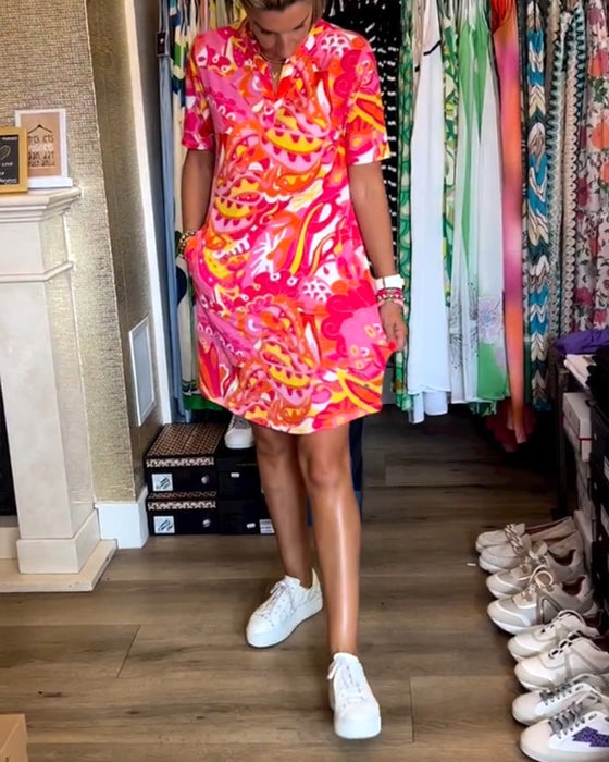 Jurk met zakken en prints en korte mouwen