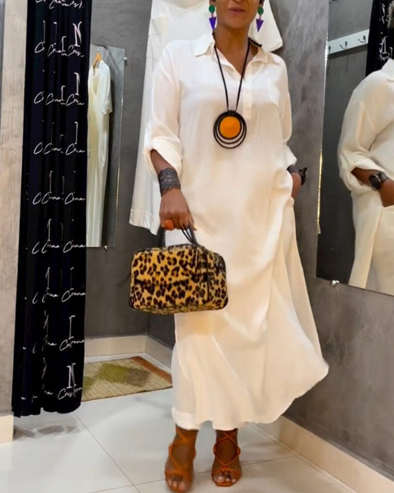 Effenkleurige jurk met revers en zak