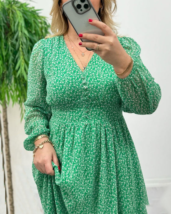 Elegante jurk met knopen en print