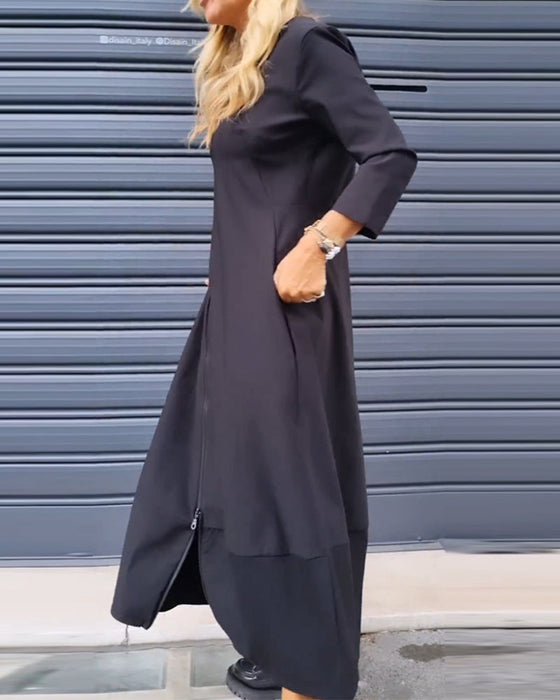 Effenkleurige jurk met ritssluiting aan de zoom