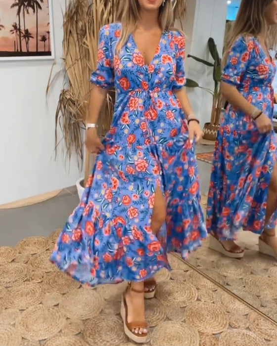 Jurk met rozenprint en splitten