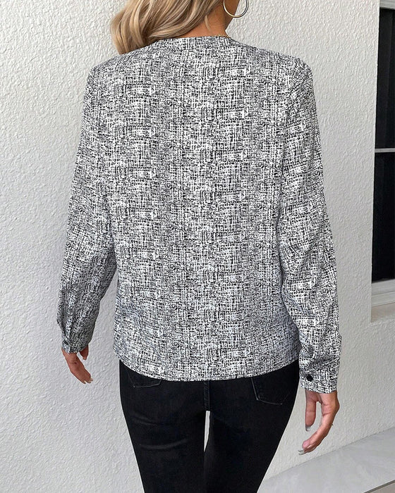 Elegante blouse met lange mouwen en V-hals
