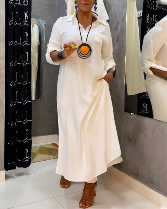 Effenkleurige jurk met revers en zak