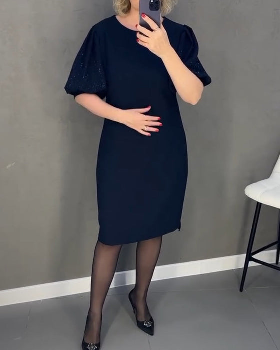 Elegante jurk met korte mouwen en pofmouwen